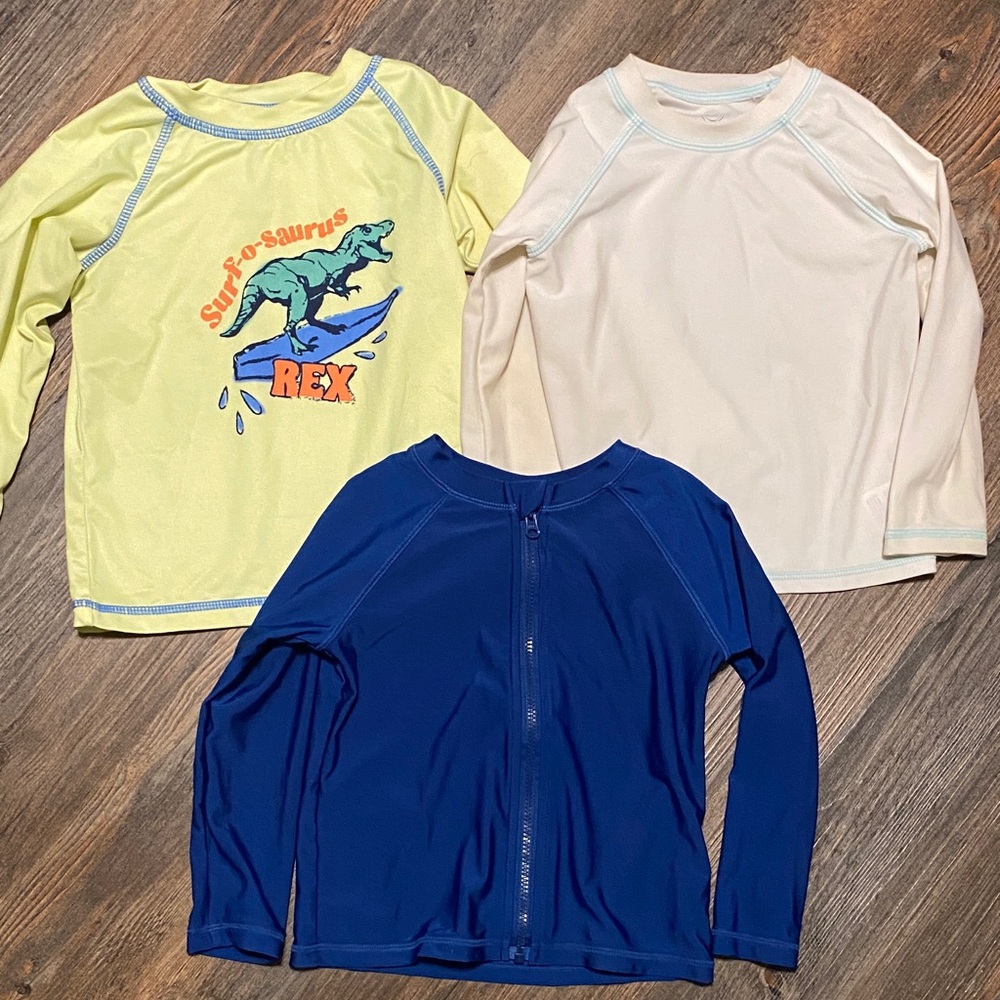 Set of 3 swim shirts/rash guards.  Size 2T. Great condition